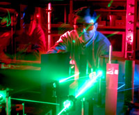 Professor using Laser Wave Mixing technique